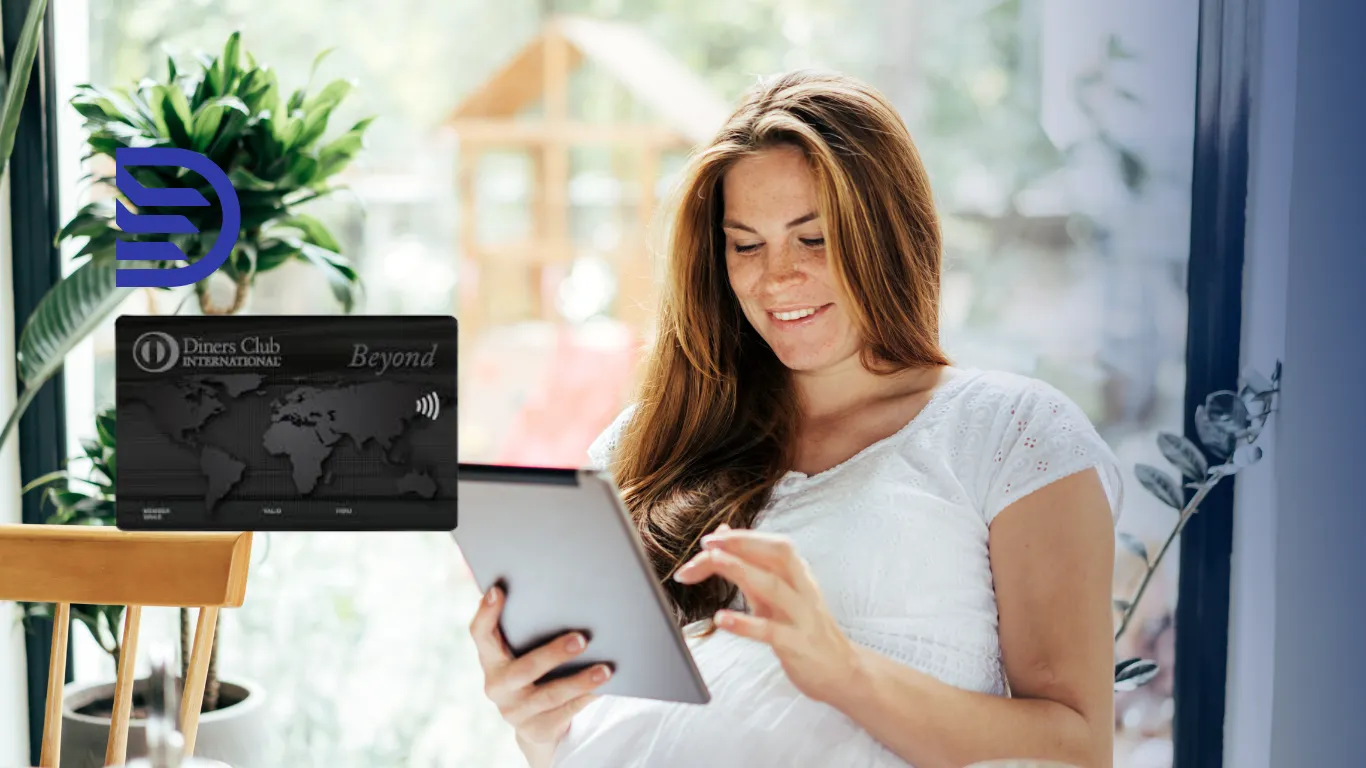 
Woman on tablet smiling with dinner card next to her